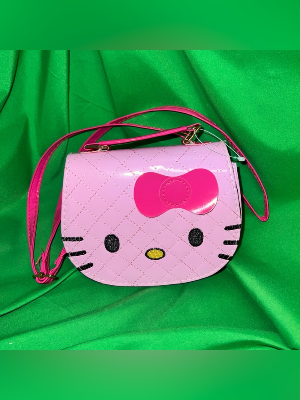 Pink Hello Kitty-Style Quilted Crossbody Bag with pink bow. NWT!